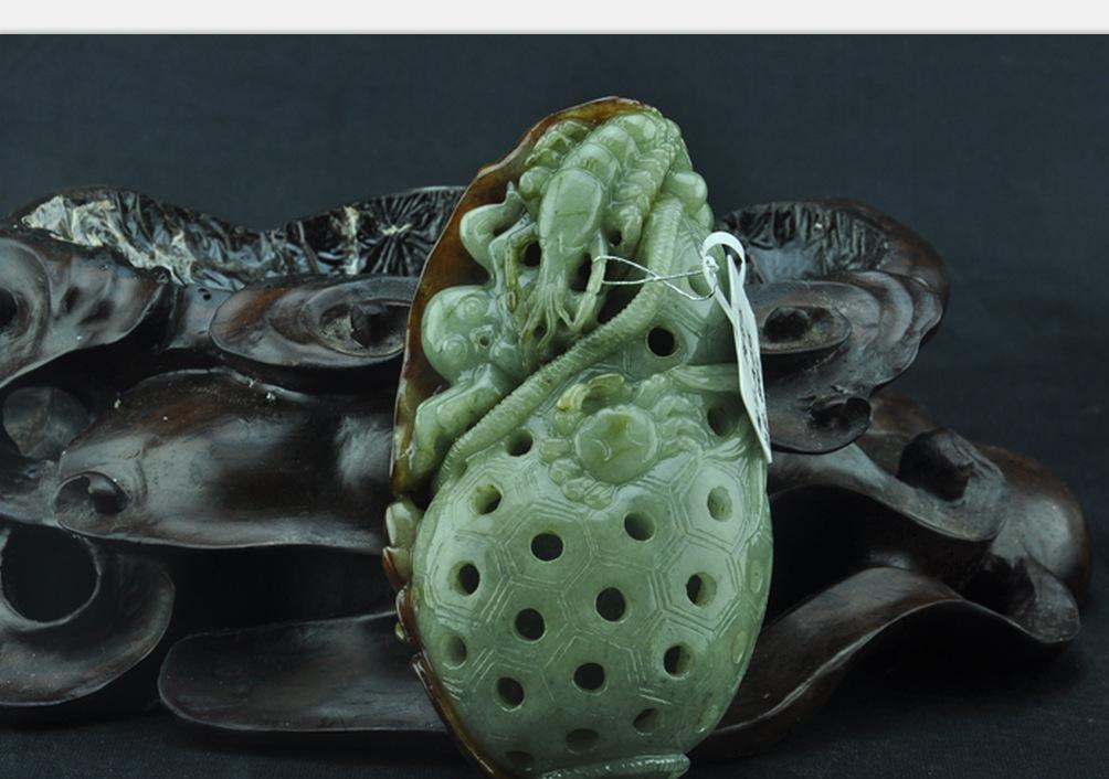 翡翠透雕的藝術(shù)——漁獲圖的寓意與工藝之美